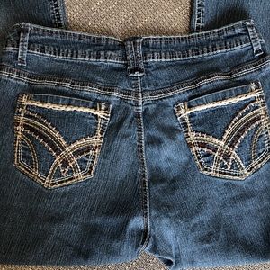 V.S.H. Jeans size 12P. Embroidered pockets and cool button details! No flaws!